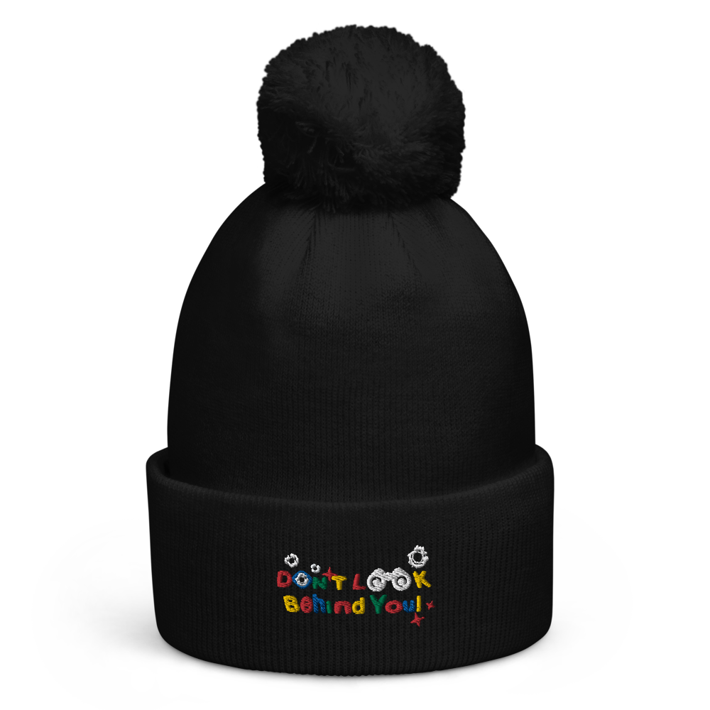 DON'T LOOK BEHIND YOU. TEXT LOGO POM BEANIE